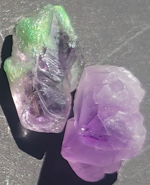 Amethyst and green-tipped crystal pair for custom gemstone candle — choose your stone at Awen Aboros