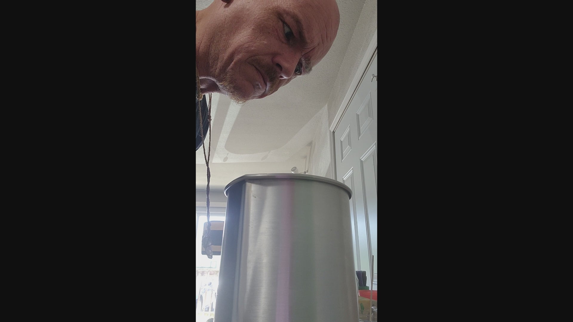 Quick video of the founder pouring melted wax into a measured pitcher to make some new product.